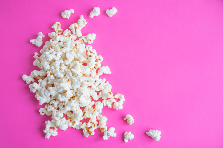 Background with a popcorn. Pink background with popcorn.の写真素材