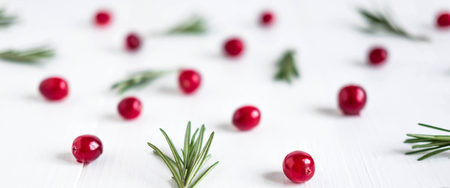 Cranberry pattern on white wooden background. Background with cranberries. Useful berries.の写真素材