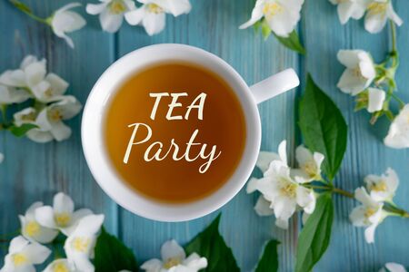 Tea party. Jasmine tea on a blue wooden background. Relaxing jasmine tea.の写真素材