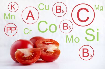 Photo of fresh tomatoes with vitamins and minerals. Healthy Vitamin Slimming Food.の写真素材