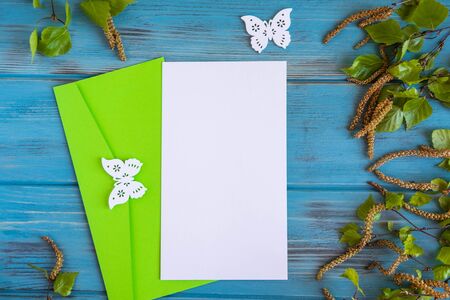 Mock up blank of a spring blank with birch branches on an aged blue background. Email form template. Spring frame for text, greetings, promotionsの写真素材