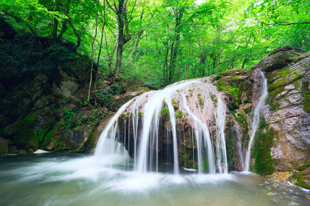 Dzhur-Dzhur waterfall on the river East Ulu-Uzen in the gorge haphal, Crimea, Russia.の写真素材