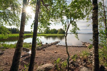 Picturesque stone shore of the island on the lake . Ladoga Skerries, Karelia.