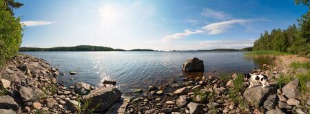 Picturesque stone shore of the island on lake Ladoga . Ladoga Skerries, Karelia. Panoramaの写真素材