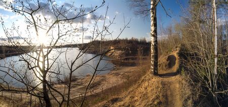 Spring sunset over the lake. Vsevolozhsk. Leningrad region.Panorama