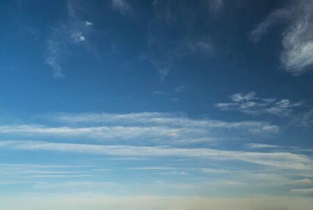 Feather clouds in the blue sky during the day
