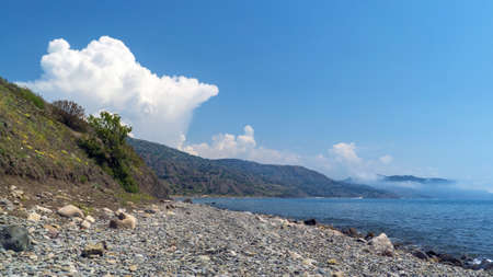 Beautiful clouds over the mountains on the seashore .Crimea. Choban-kule