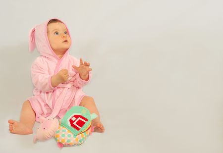 Little  wearing a rabbit bathrobeの写真素材