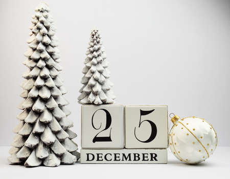 White theme, save the date white block calendar for Christmas Day, December 25, with Christmas trees and baubles の写真素材