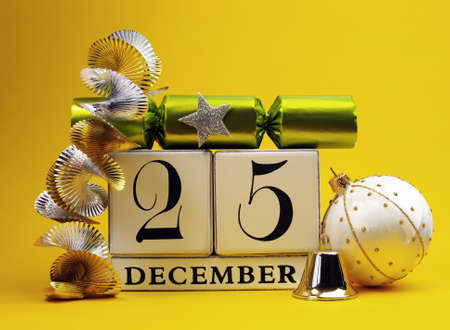 Yellow theme Save the Date white block calendar for Christmas Day, December 25, with colorful...
