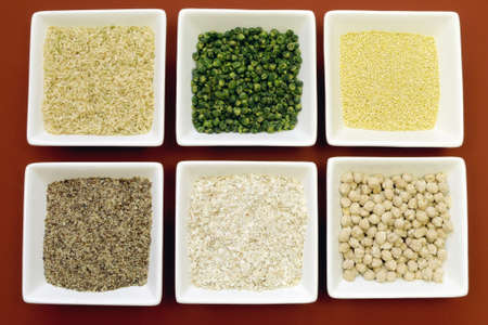 Gluten free grains food - brown rice, millet, LSA, buckwheat flakes and chickpeas and green peas legumes - for a healthy diet free of celiac disease  Close-up の写真素材