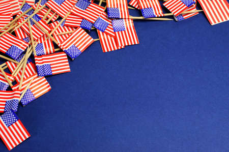 Abstract background of USA Stars and Stripes, red white and blue national toothpick flags for national emblem or public holiday event, with copy space for your text here の写真素材