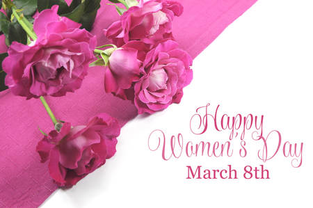 Happy International Womens Day, March 8, celebration greeting message with pink roses Happy International Womens Day, March 8, celebration greeting message with pink roses