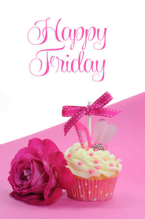 Fuchsia pink theme cupcake with shoe and heart decoration and beautiful rose, with Happy Friday sample text or copy space for text here.の写真素材