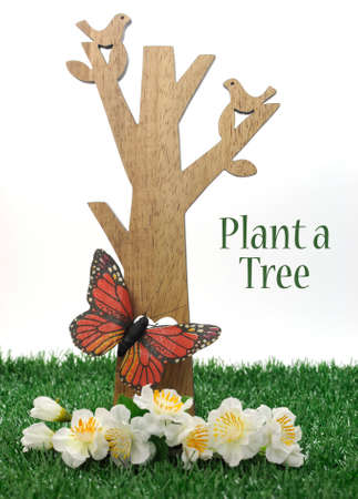 Happy Arbor Day, Plant a Tree greeting for last Friday in April, with wood tree, carved birds,...