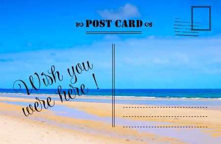 Wish You Were Here summer vacation postcard with scenic ocean beach viewの写真素材