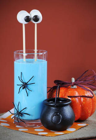 Happy Halloween marshmallow extended martian eyes in blue banana smoothie for fun party drink.の写真素材