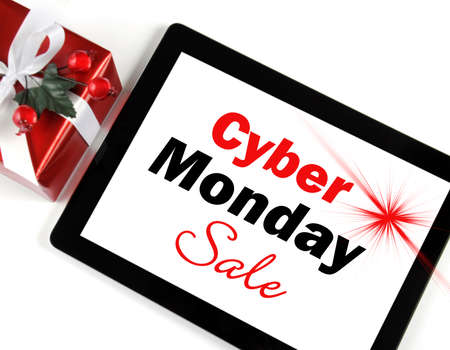 Cyber Monday Sale shopping message on black computer tablet device on white background with...