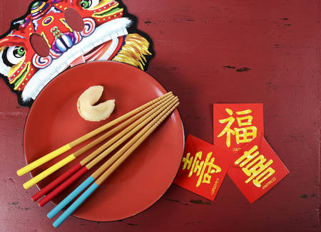 Happy Chinese New Year celebration party table on red wood background.の写真素材