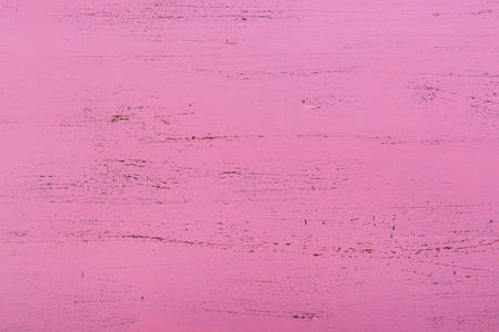 Pink rustic distressed on reclaimed wood background for feminine or valentine backgrounds.の写真素材