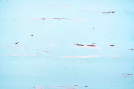Pale blue rustic distressed reclaimed wood background.の写真素材