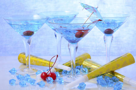 Happy New Year Party Drinks in martini cocktail glasses with cherries.の写真素材