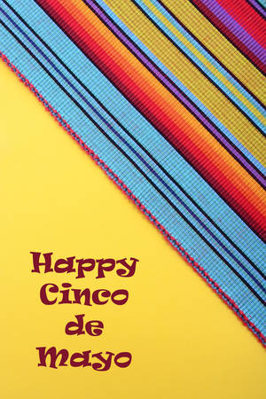 Cinco de Mayo festive stripe material on yellow background, with copy space.の写真素材