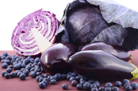 Purple fruits and vegetables thay contain Anthocynins, found in the Okinawan diet, that maintain healthy blood vessels and promote longevity.の写真素材