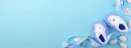 Its a boy, blue theme Baby Shower or Nursery background with decorated borders, sized to fit a popular social media cover image placeholder.の写真素材