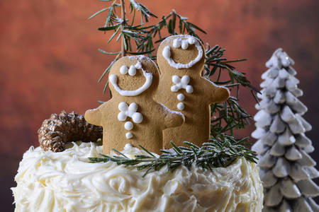 Festive holidays Christmas showstopper centerpiece white chocolate cake with gingerbread men...