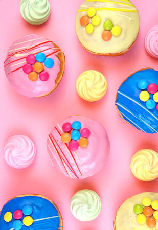Pop Art Color style donuts and bakery goodies on bright colorful background.