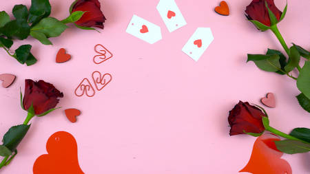 Happy Valentines Day overhead flat lay wrapping gift and writing cards.の写真素材