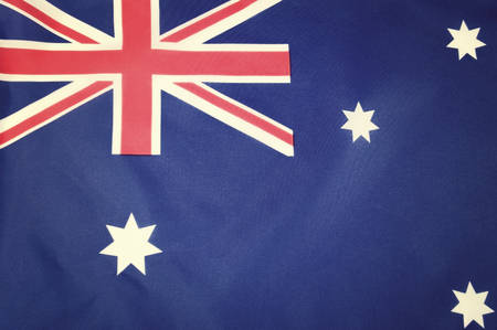 Flag of Australia with vintage wash filter, full frame.の写真素材
