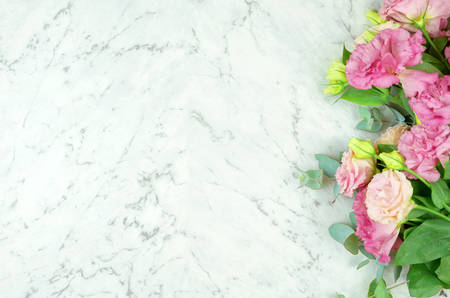 White marble texture  copy space with pink flowers border frame.の写真素材