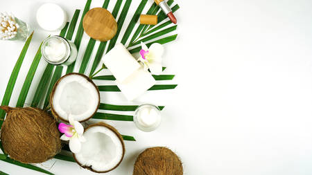 Coconut cosmetics with soaps, moisturizers and beauty products.の写真素材