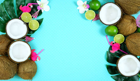 Coconut summertime theme flat lay creative layout overhead.