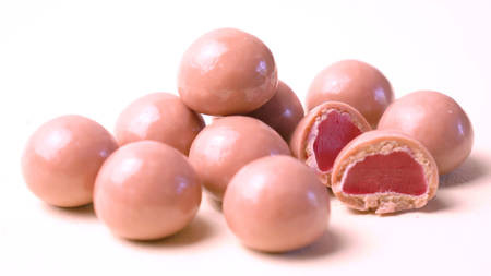 Ruby chocolate close up on white