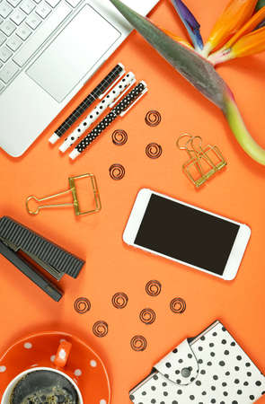 Desktop workspace with hi-tech laptop and modern colorful accessories.の写真素材
