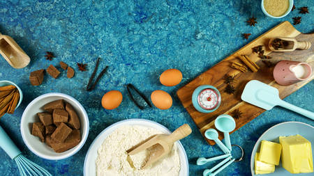 Baking flatlay creative composition for chocolate recipes on vintage blue table.の写真素材