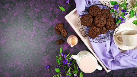 Serving freshly baked double chocolate chip homemade cookies on pink tray.の写真素材