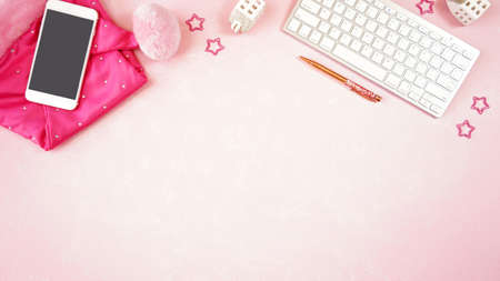 Christmas shopping pink desktop workspace blog header overhead flat lay.
