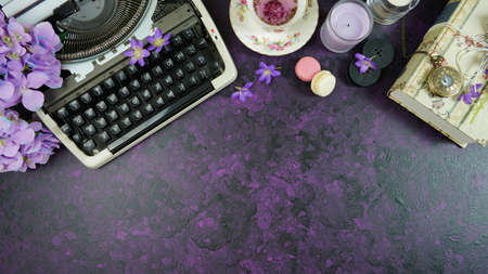 Purple theme vintage writers blog header overhead flat lay.