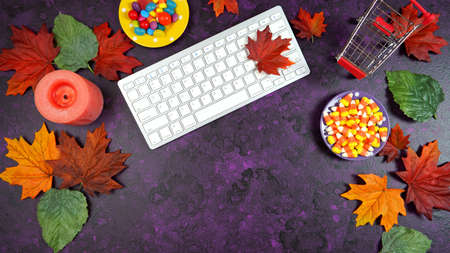 Halloween Trick or Treat desktop workspace blog header overhead flat lay.
