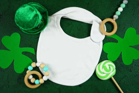 Happy St Patricks Day baby wear white mockup flatlay.の写真素材