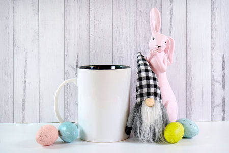 Easter product mockup with farmhouse theme on white wood background.の写真素材