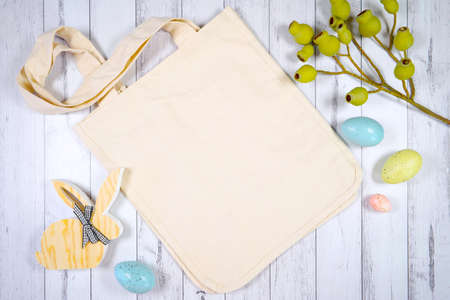 Easter product mockup with farmhouse theme on white wood background.の写真素材