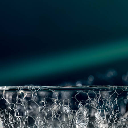 A Closeup of Water Bubbles with Colored Background