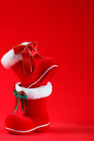 santa claus boots, on a red backgroud