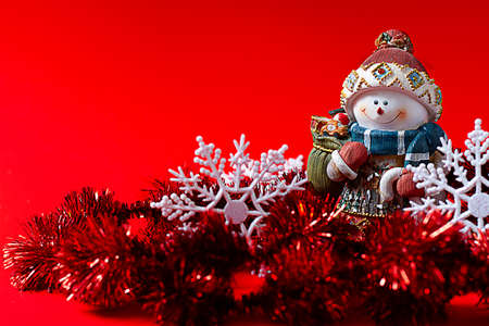 Christmas toys, snowman, Happy New Year 2021, Merry Christmas, on a red blackground, horizontalの写真素材