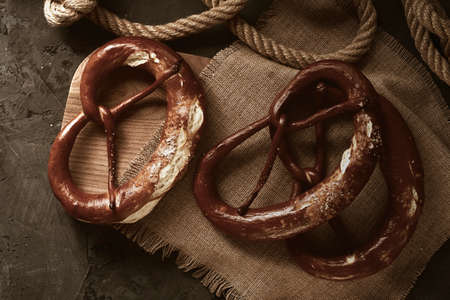 Pretzels, dark background, top view, no people, horizontal,の写真素材